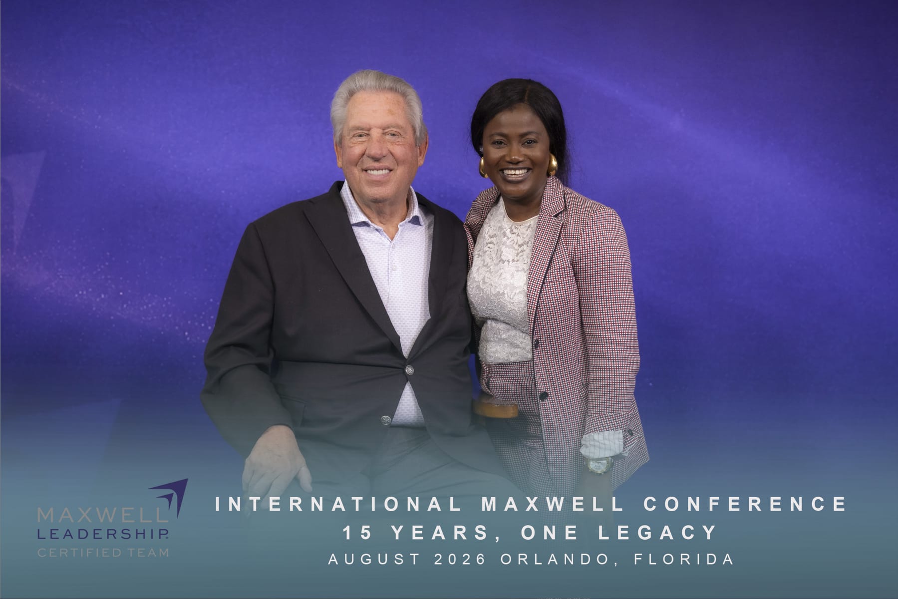 Kemi Areola with John C. Maxwell at the International Maxwell Conference